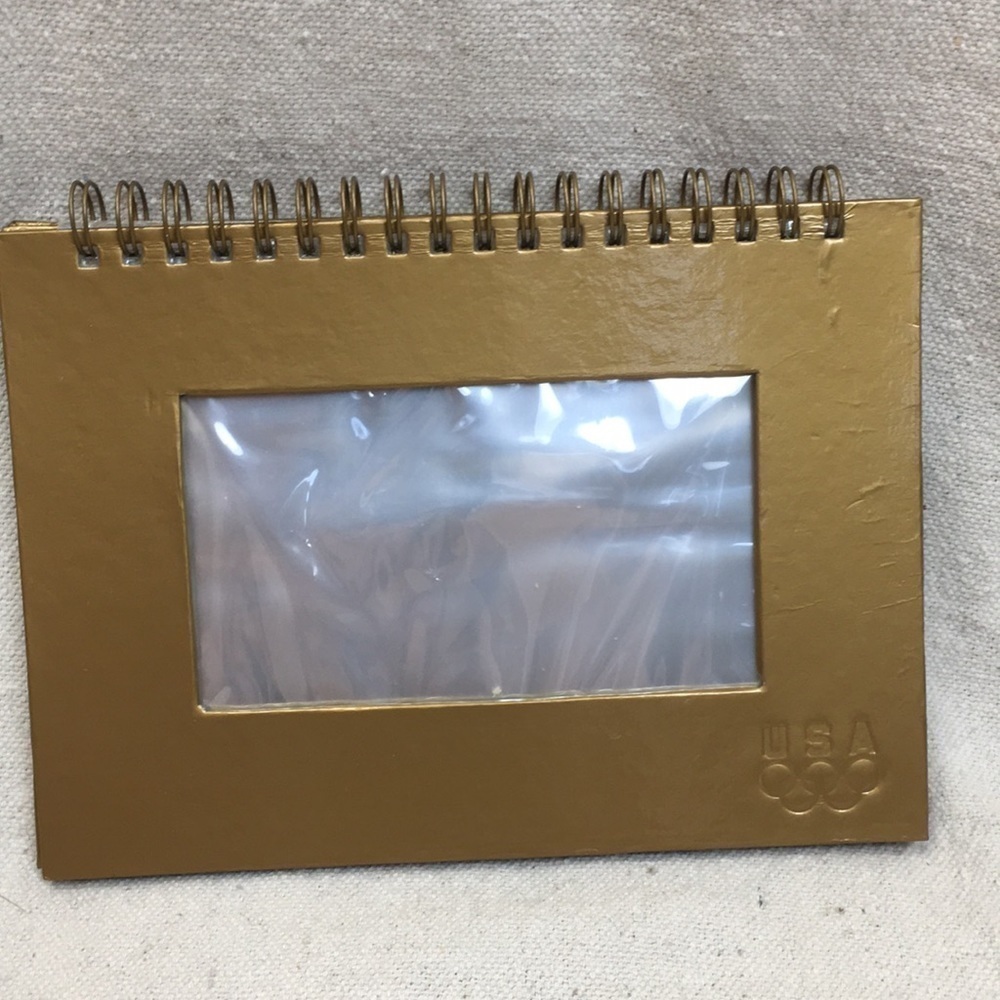 Spiral bound Olympic photo album/frame